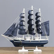 купить Корабль сувенирный средний Калева, борта синие с белой полосой, паруса синие, 30х7х32 см