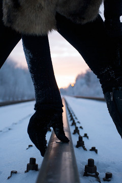 Half_woman_in_rail_tracks